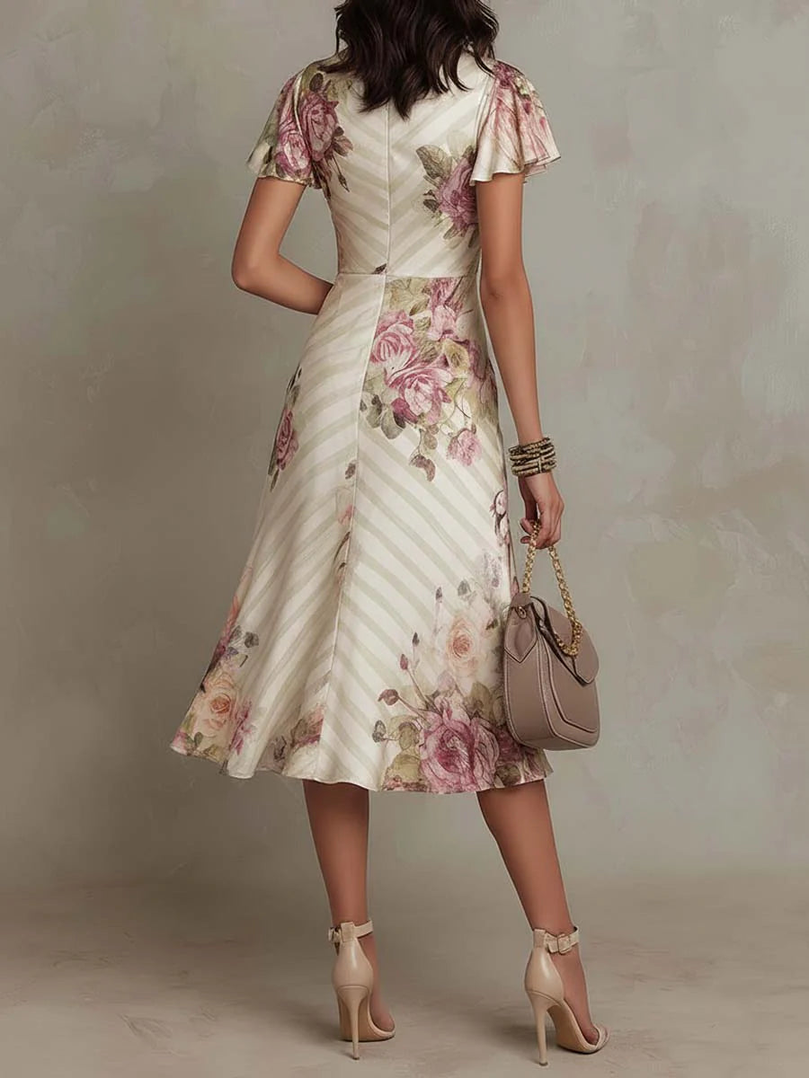 Abito midi in raso con motivo floreale, elegante e dal gusto retrò