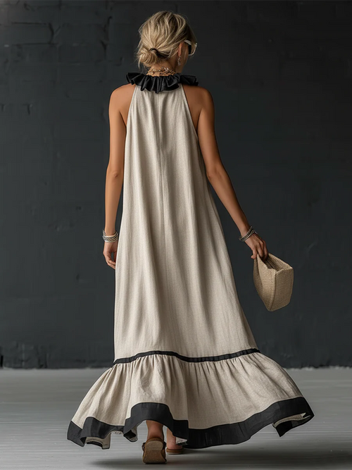 Abito lungo elegante con volant